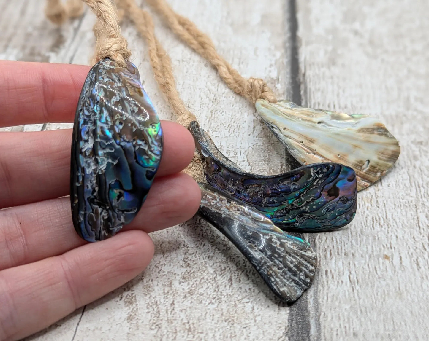 Set of Four Wild New Zealand wild Pāua Shell Ornaments – Natural Beach combed Abalone Decorations on Jute Cord for Yule for Christmas trees.