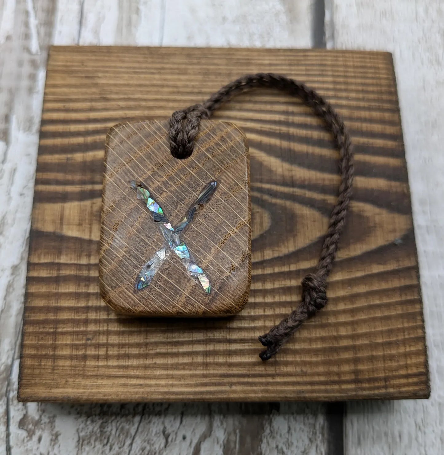 Oak wood gebo rune Christmas decoration with Pāua shell.