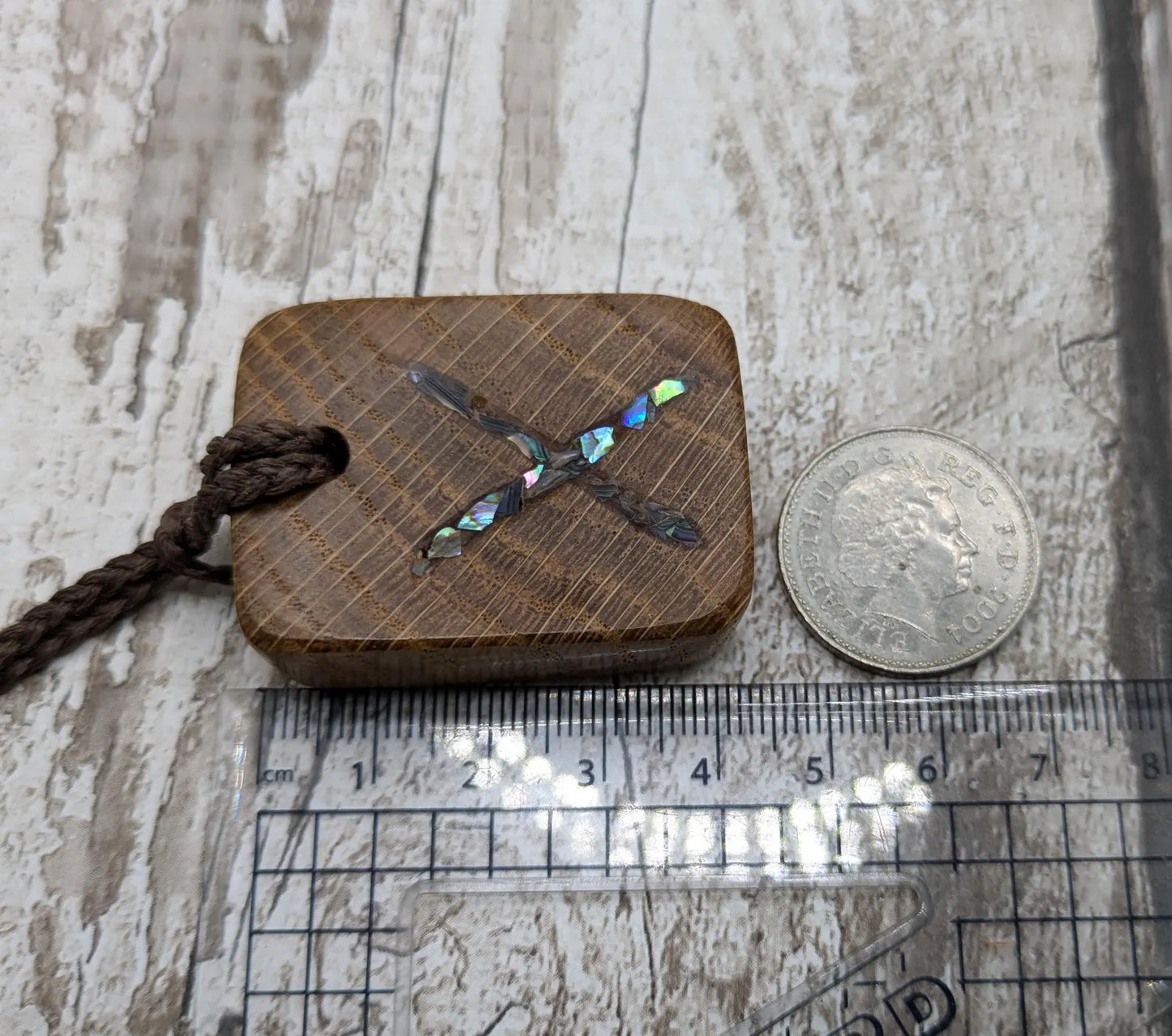 Oak wood gebo rune Christmas decoration with Pāua shell.