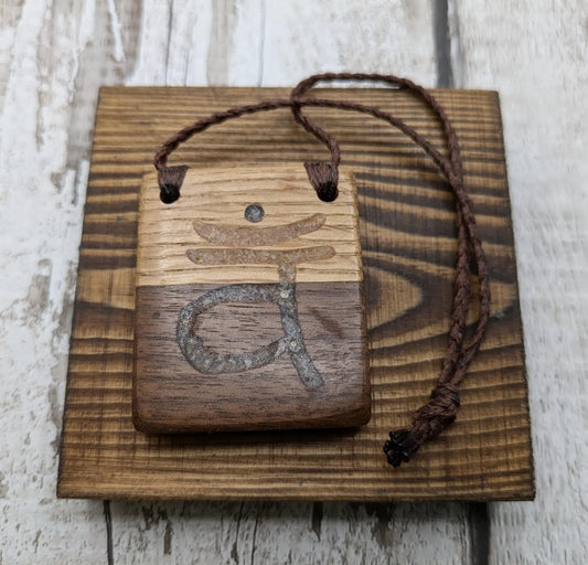 Oak and walnut sacral chakra sunstone hand carved Christmas decoration.