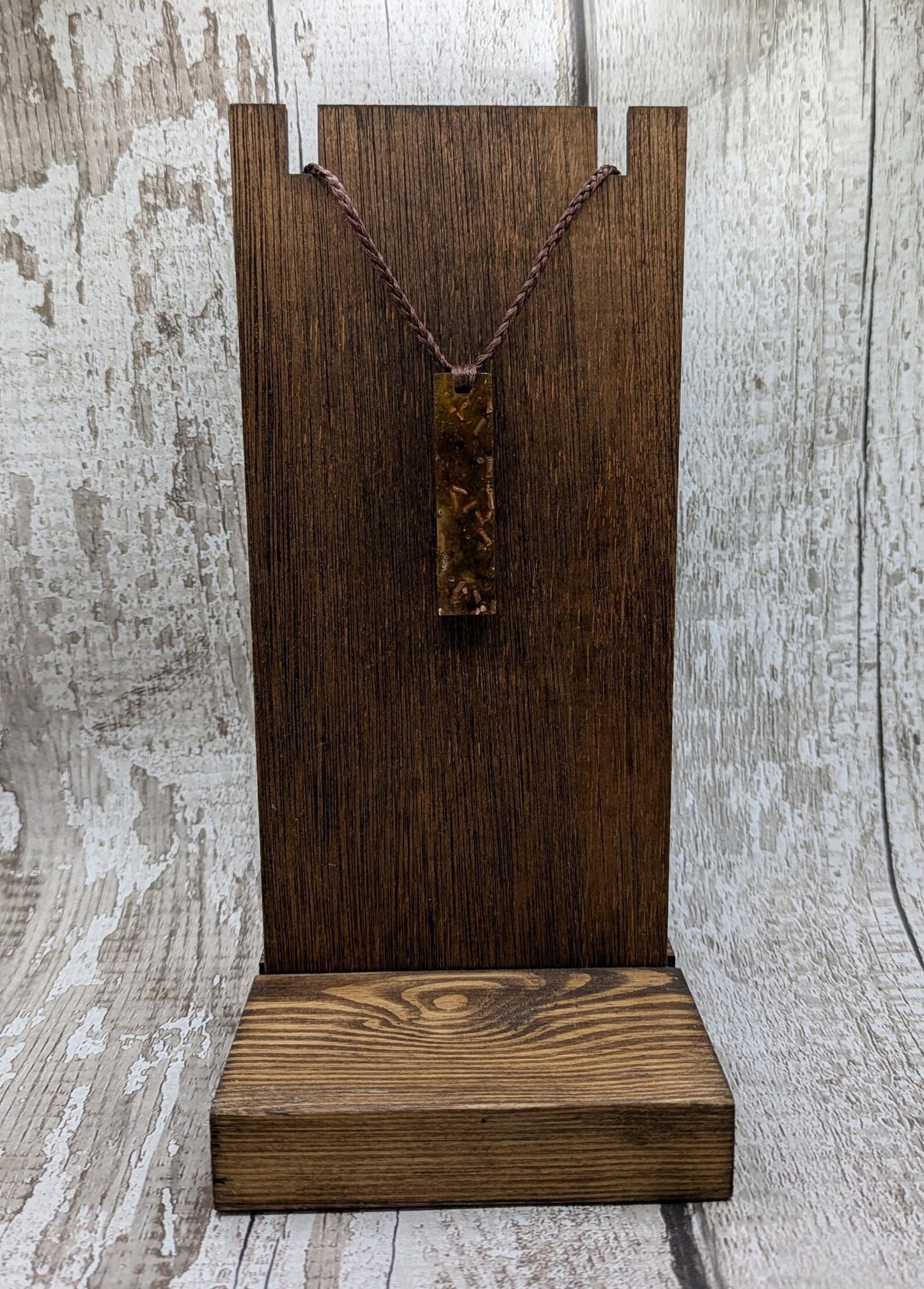 Baltic Amber and copper in resin pendant.