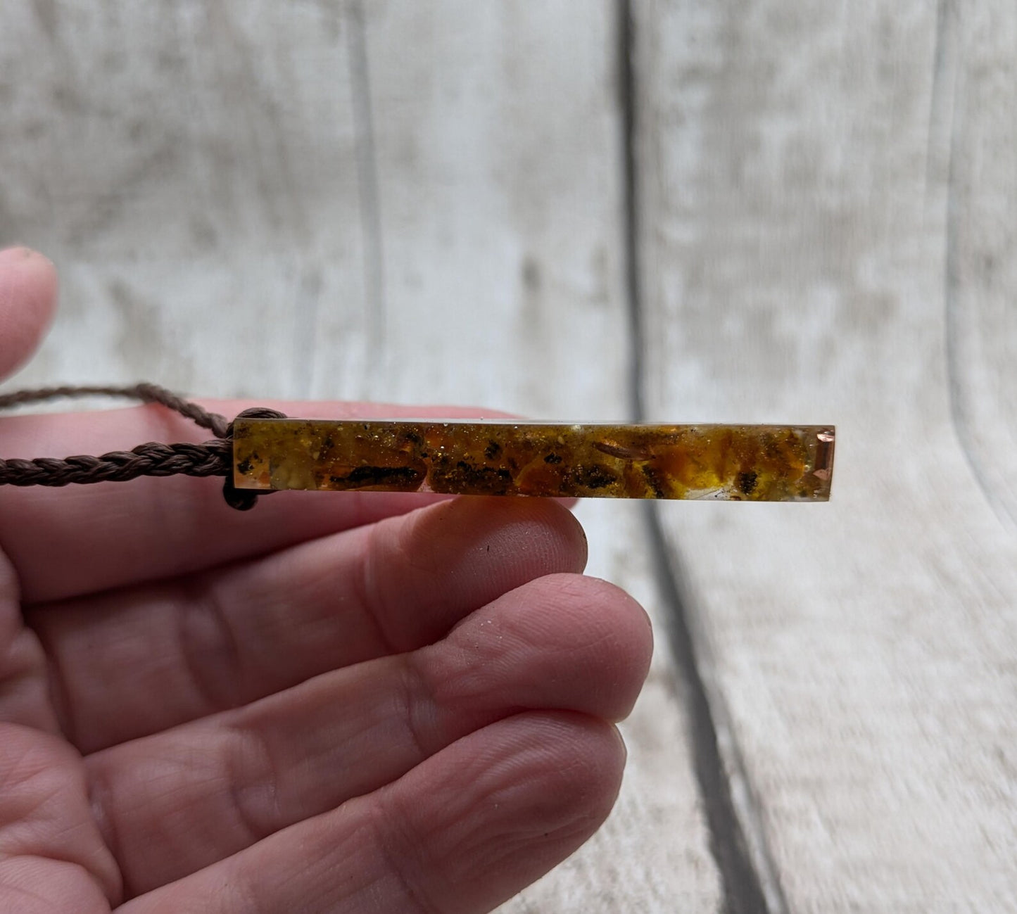 Baltic Amber and copper in resin pendant.