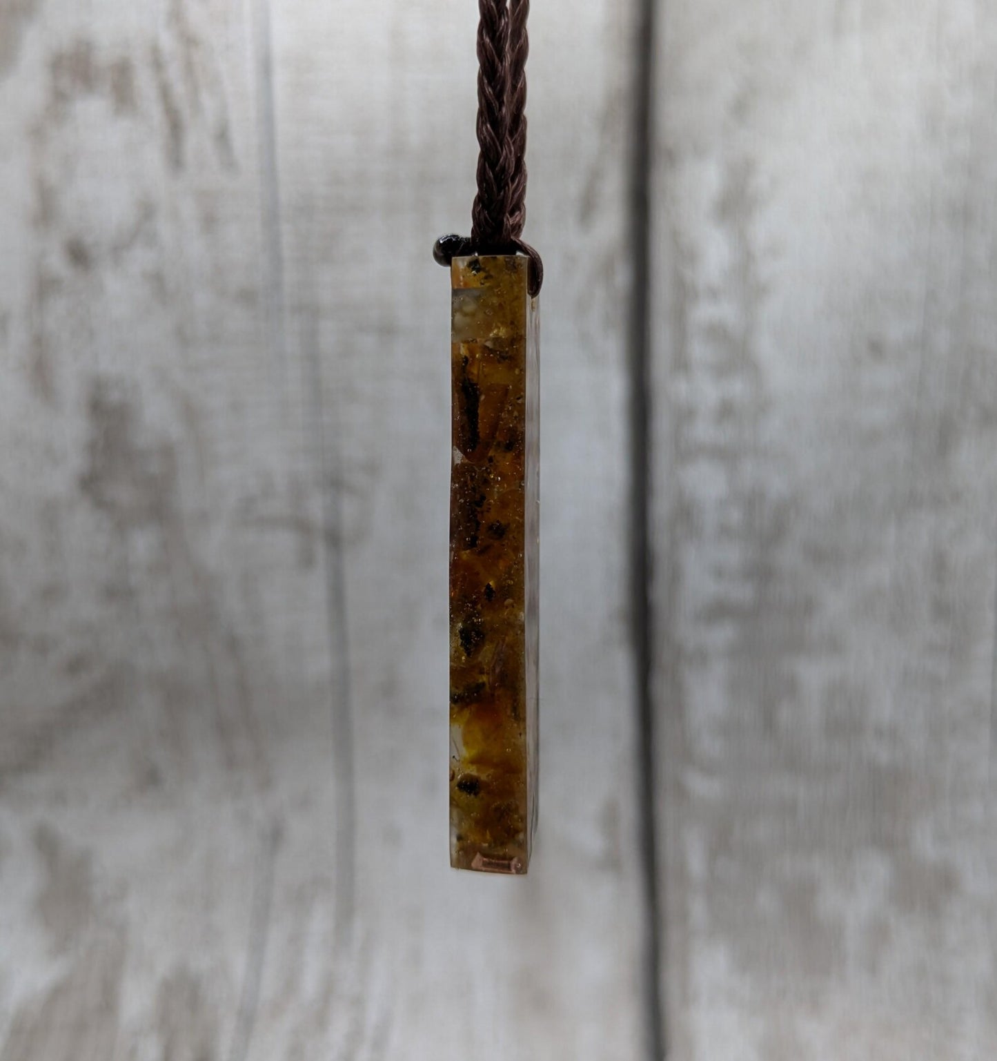 Baltic Amber and copper in resin pendant.