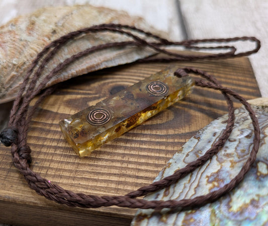 Baltic Amber and copper in resin pendant.