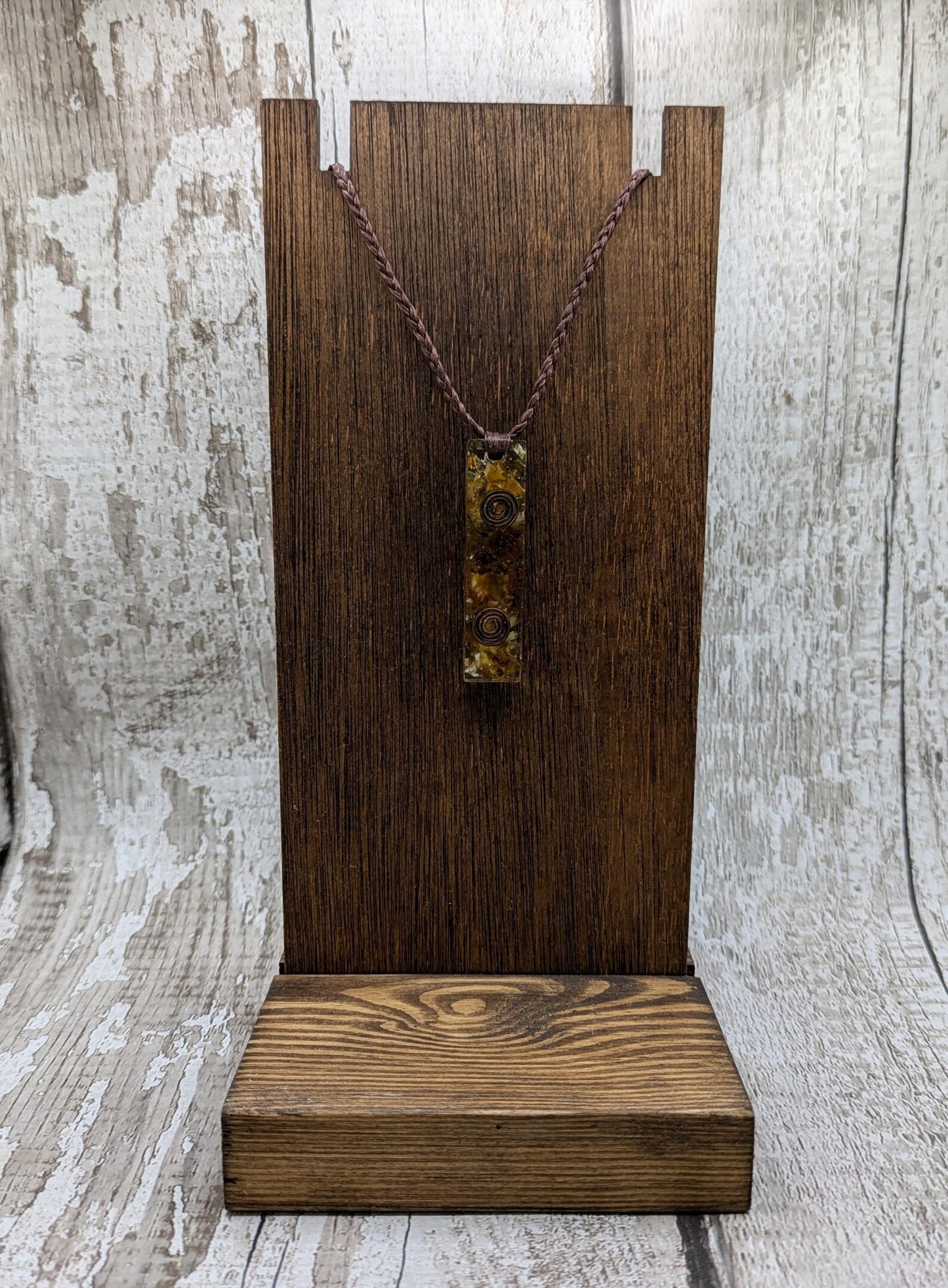 Baltic Amber and copper in resin pendant.