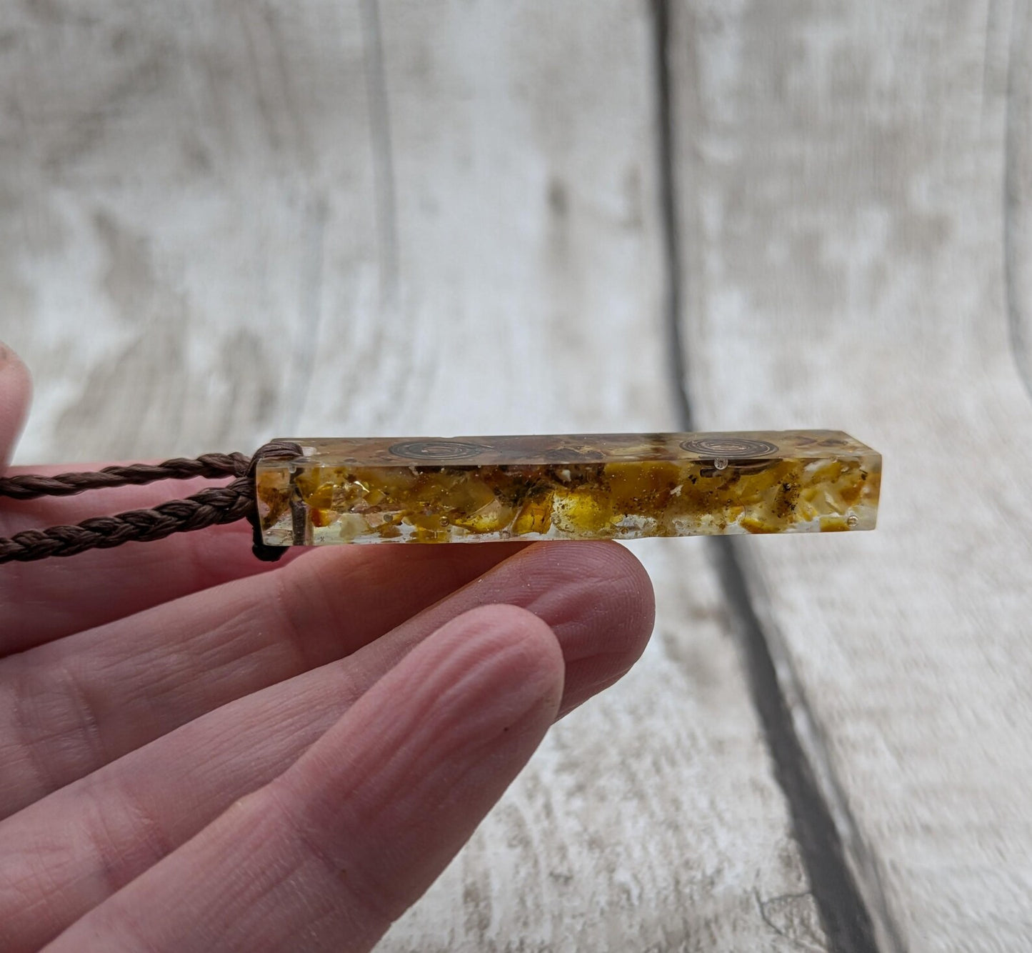 Baltic Amber and copper in resin pendant.