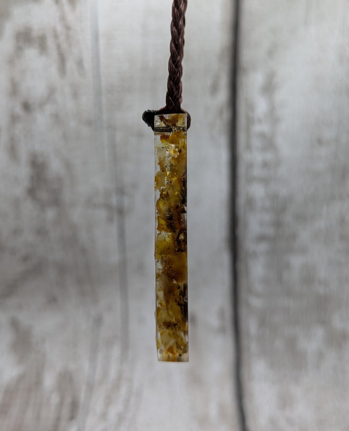 Baltic Amber and copper in resin pendant.