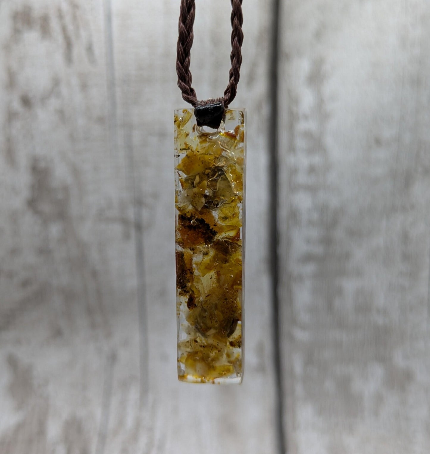 Baltic Amber and copper in resin pendant.