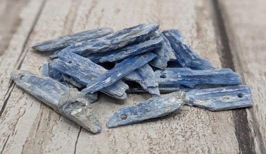 18 small blue kyanite beads.