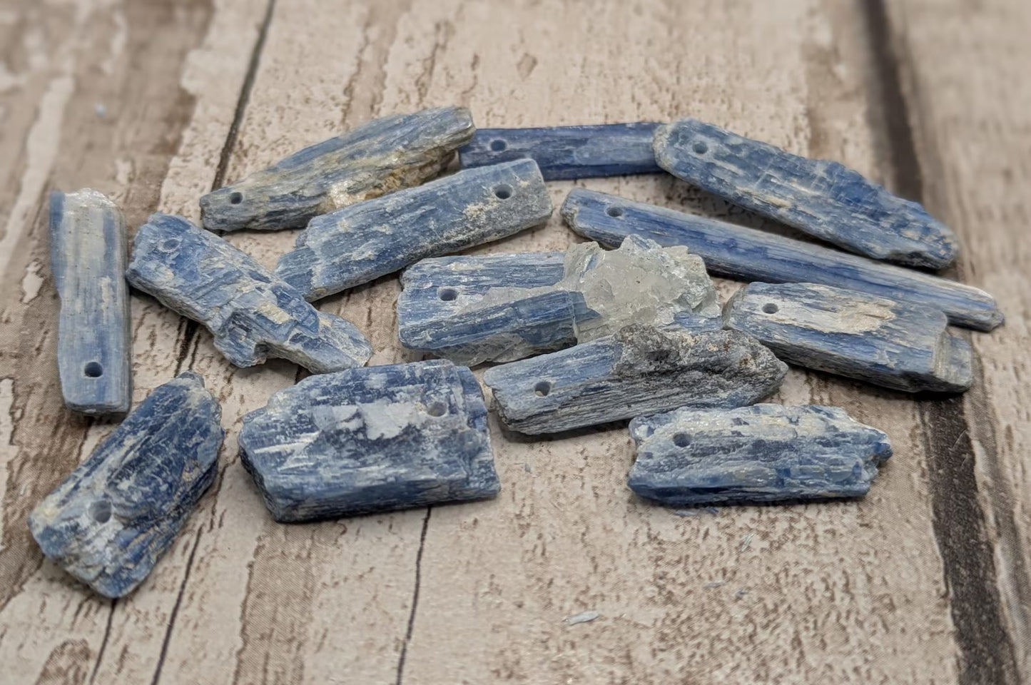 14 chunky small blue kyanite beads.