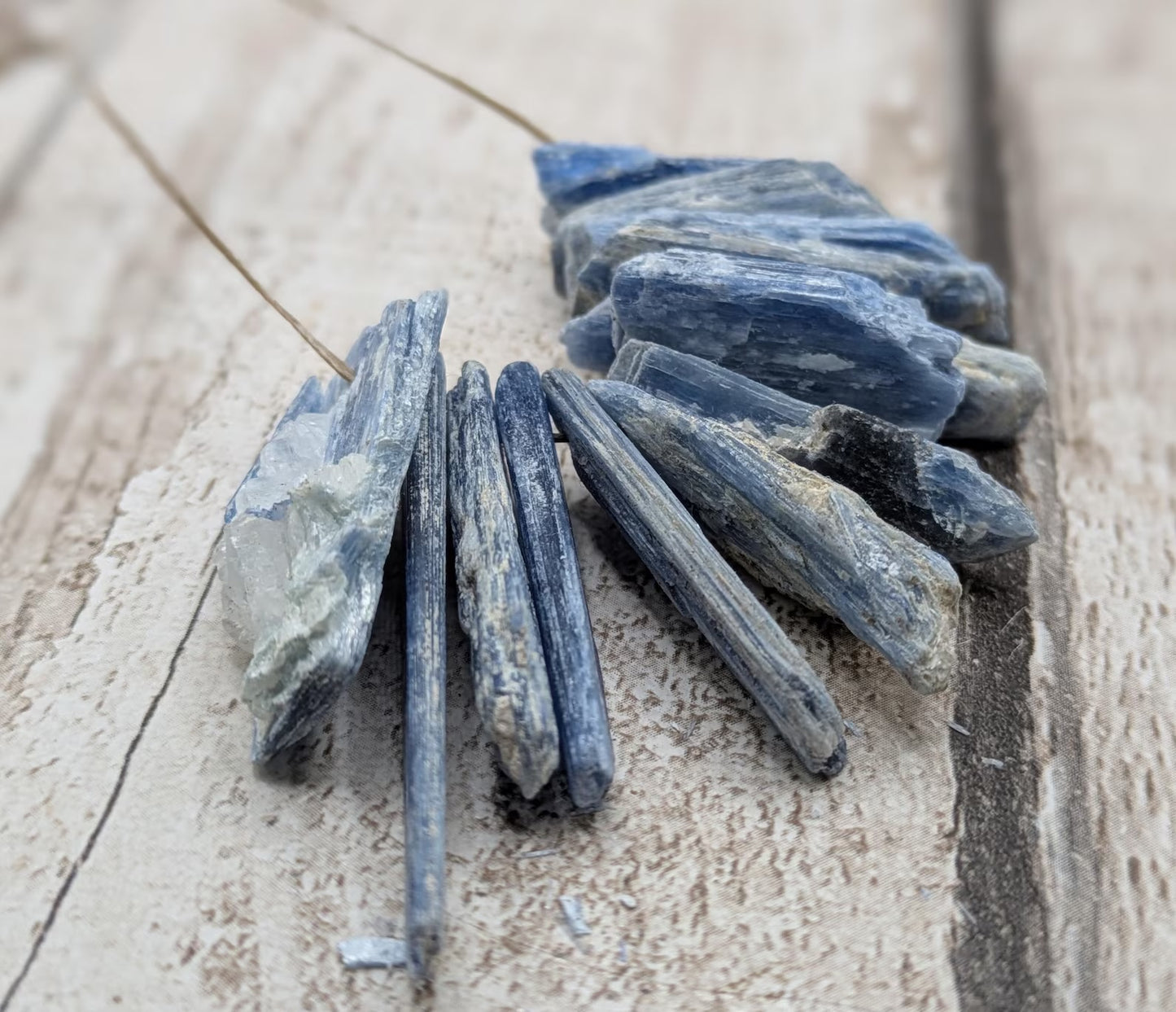14 chunky small blue kyanite beads.