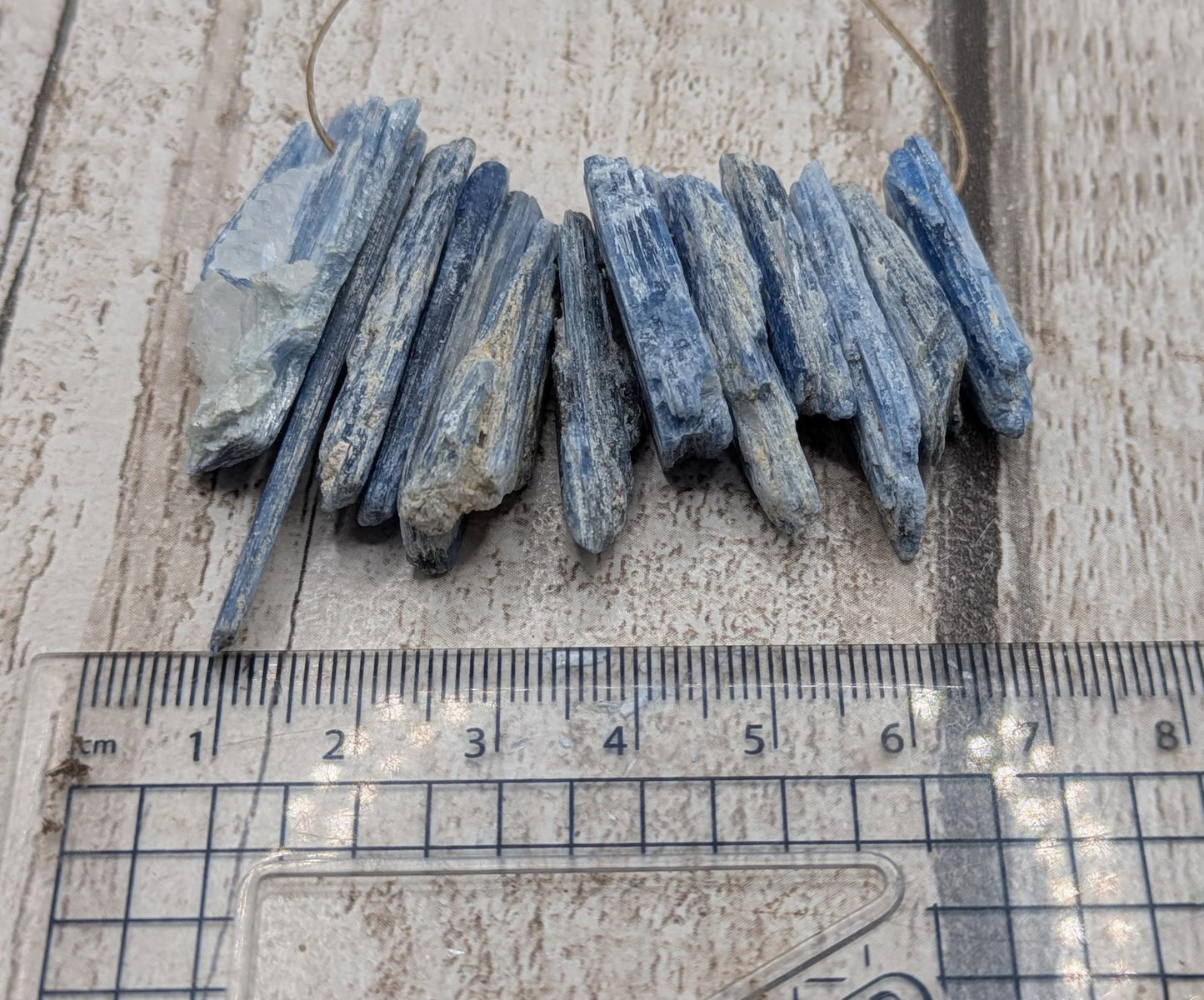 14 chunky small blue kyanite beads.