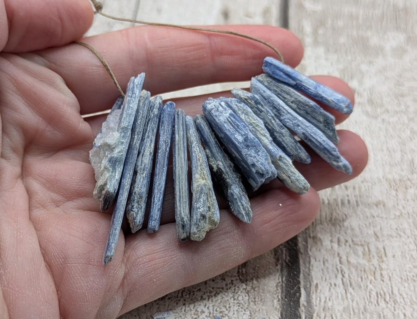 14 chunky small blue kyanite beads.