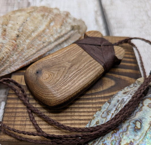 Laburnum wood, live edge, hey Toki adze pendant.