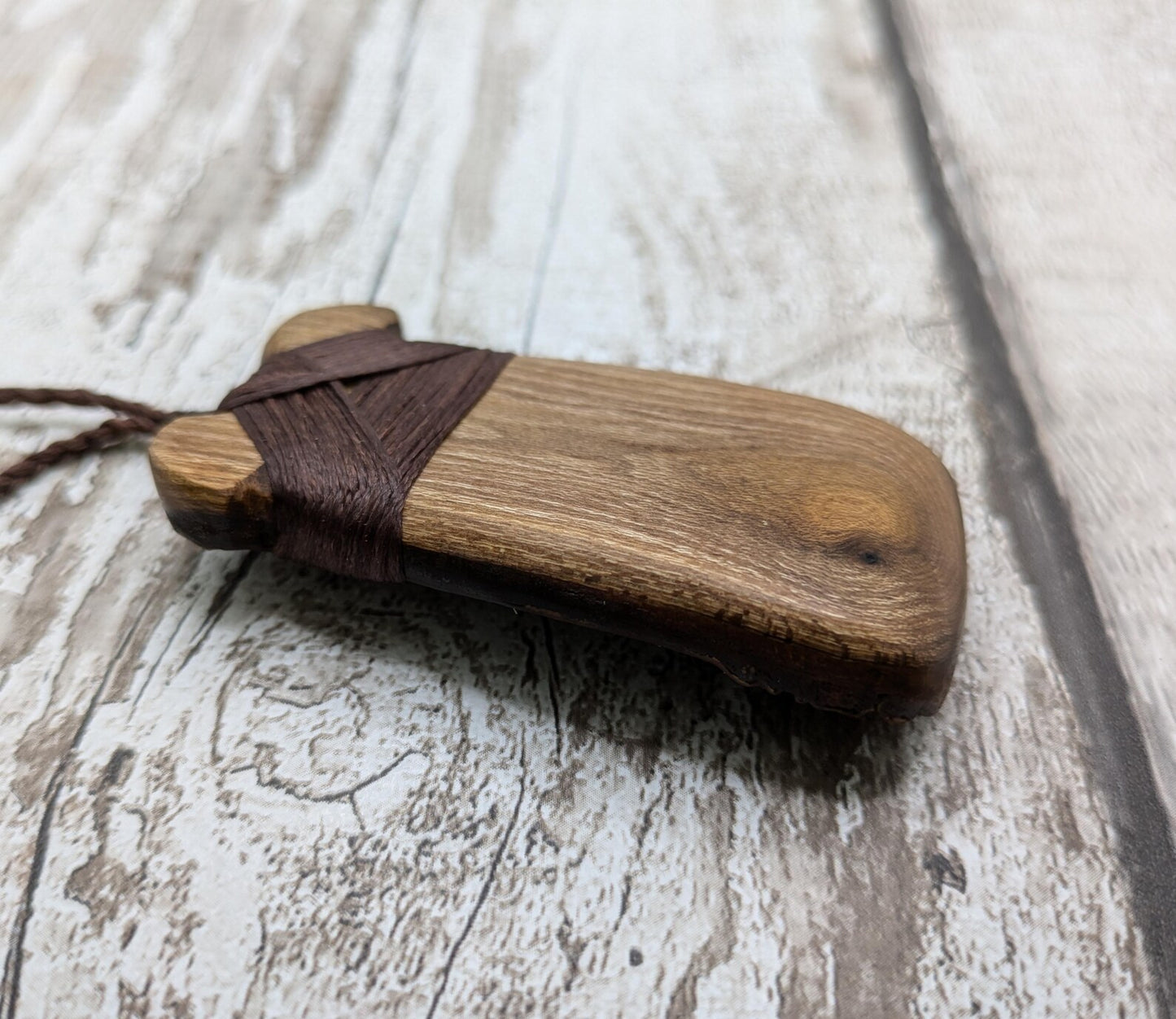 Laburnum wood, live edge, hey Toki adze pendant.