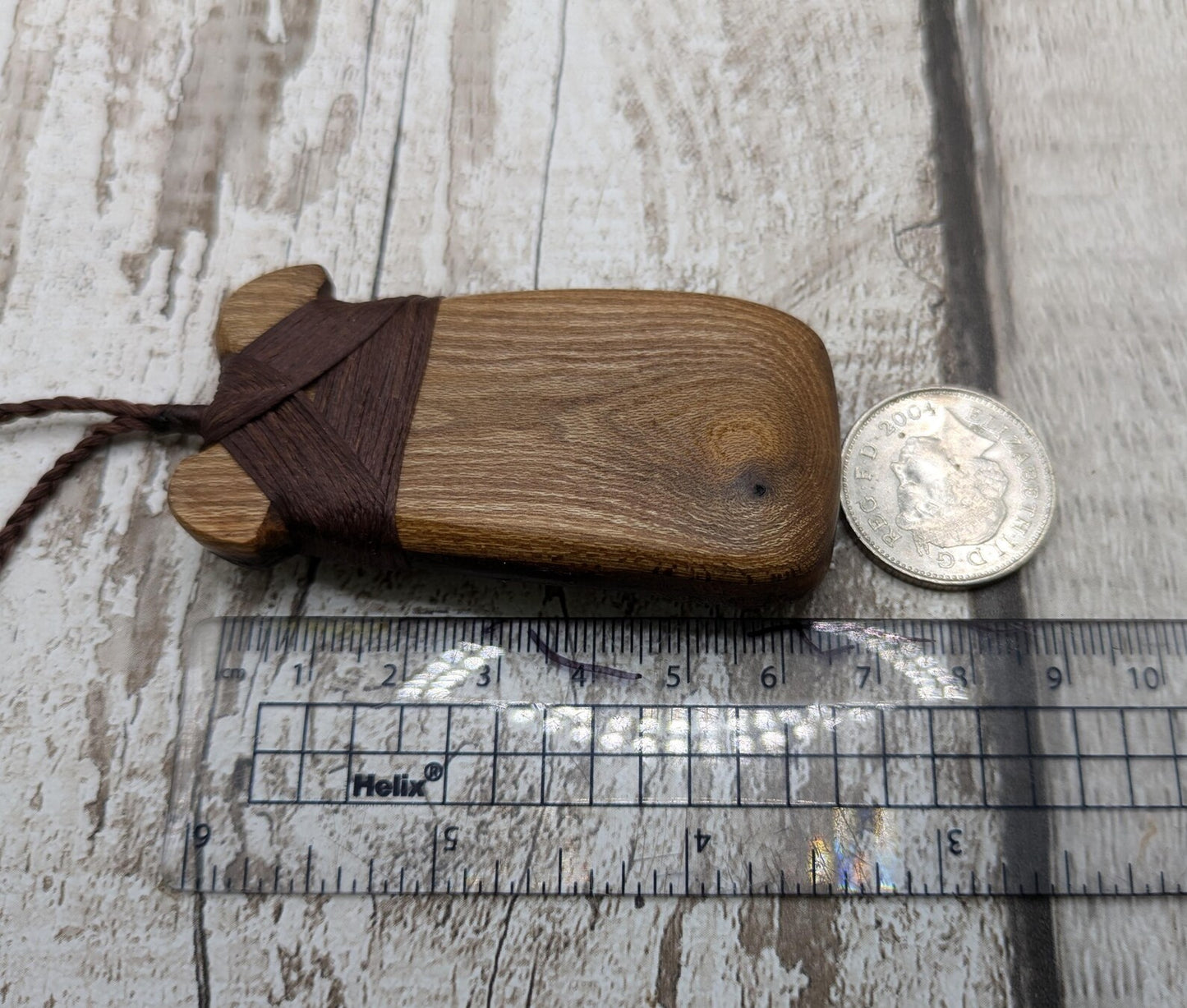 Laburnum wood, live edge, hey Toki adze pendant.