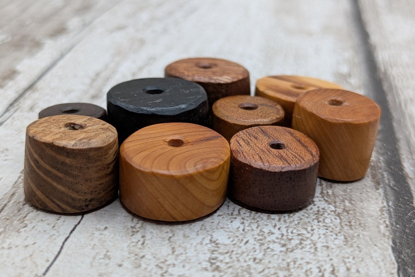 10 mixed random wooden tube beads.
