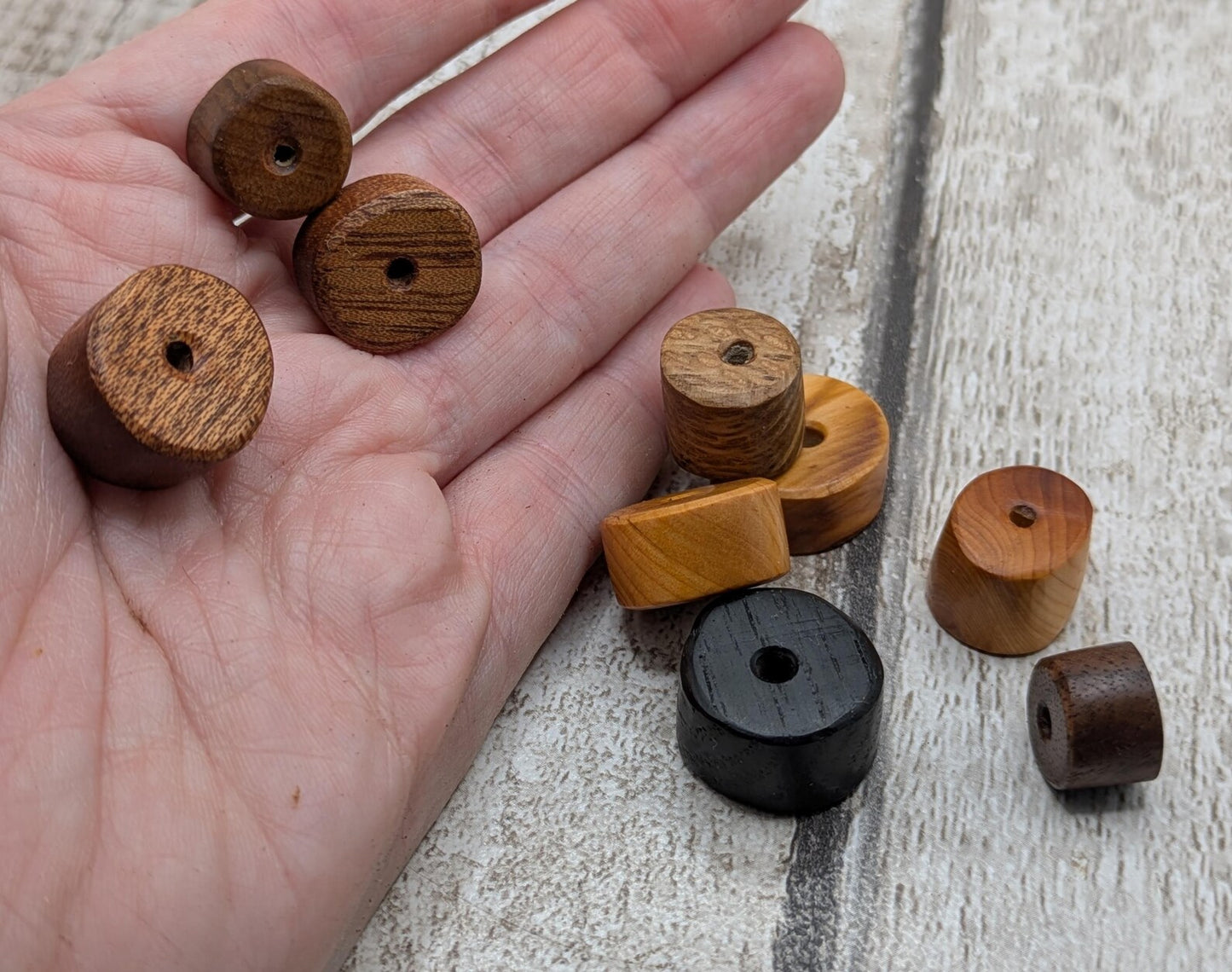 10 mixed random wooden tube beads.