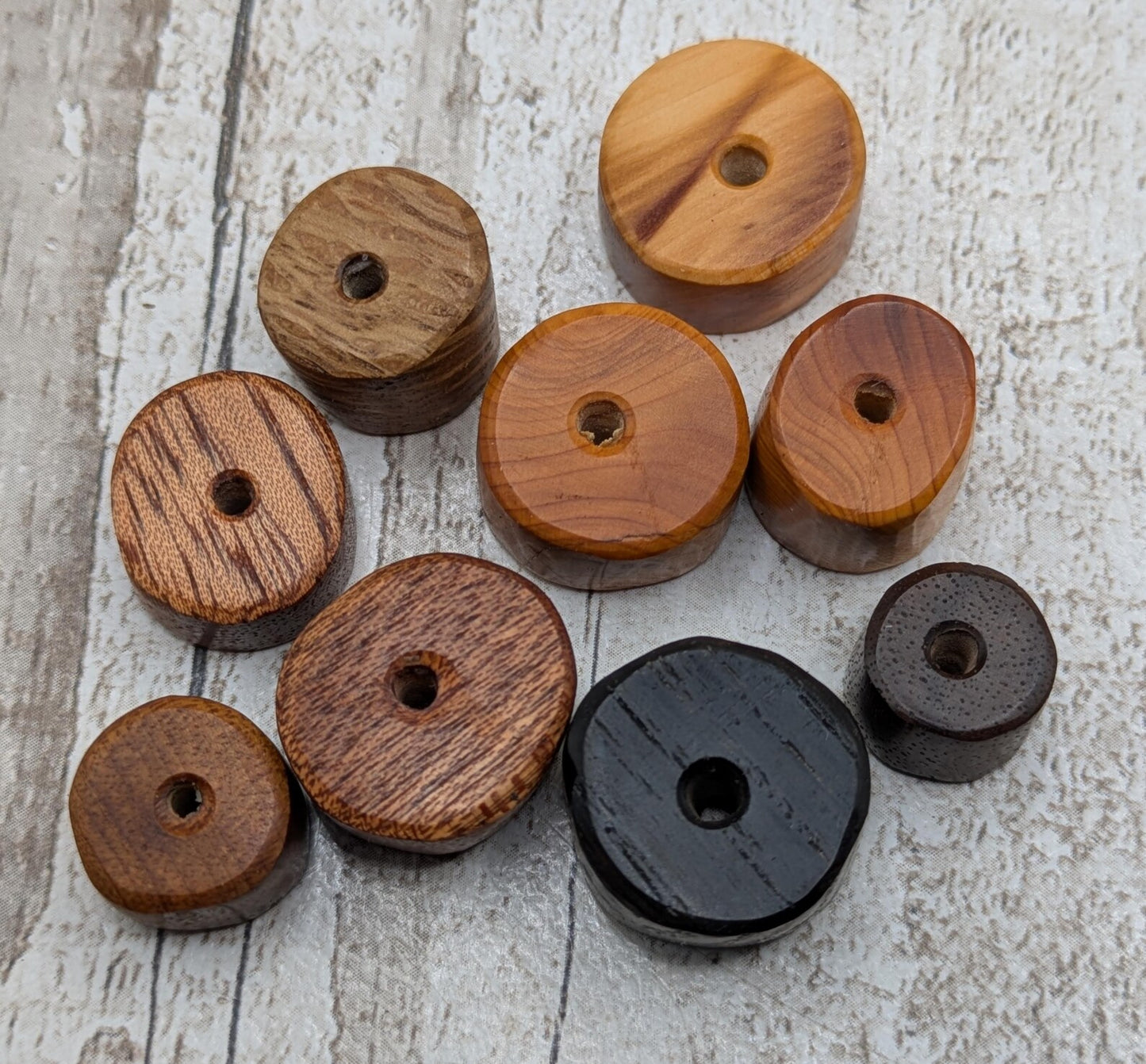 10 mixed random wooden tube beads.