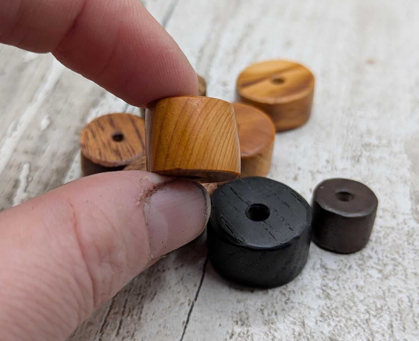 10 mixed random wooden tube beads.
