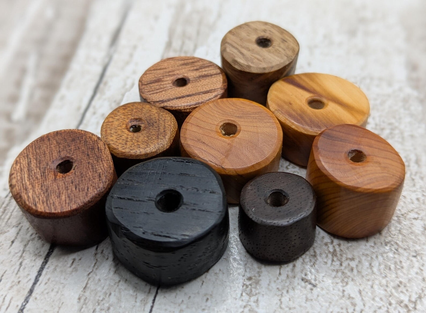 10 mixed random wooden tube beads.