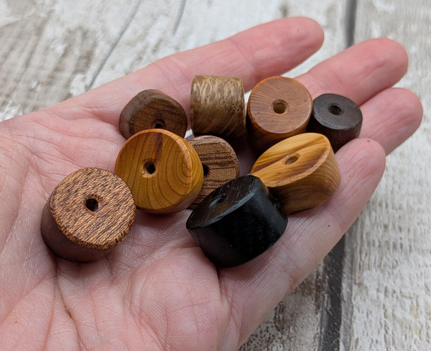 10 mixed random wooden tube beads.