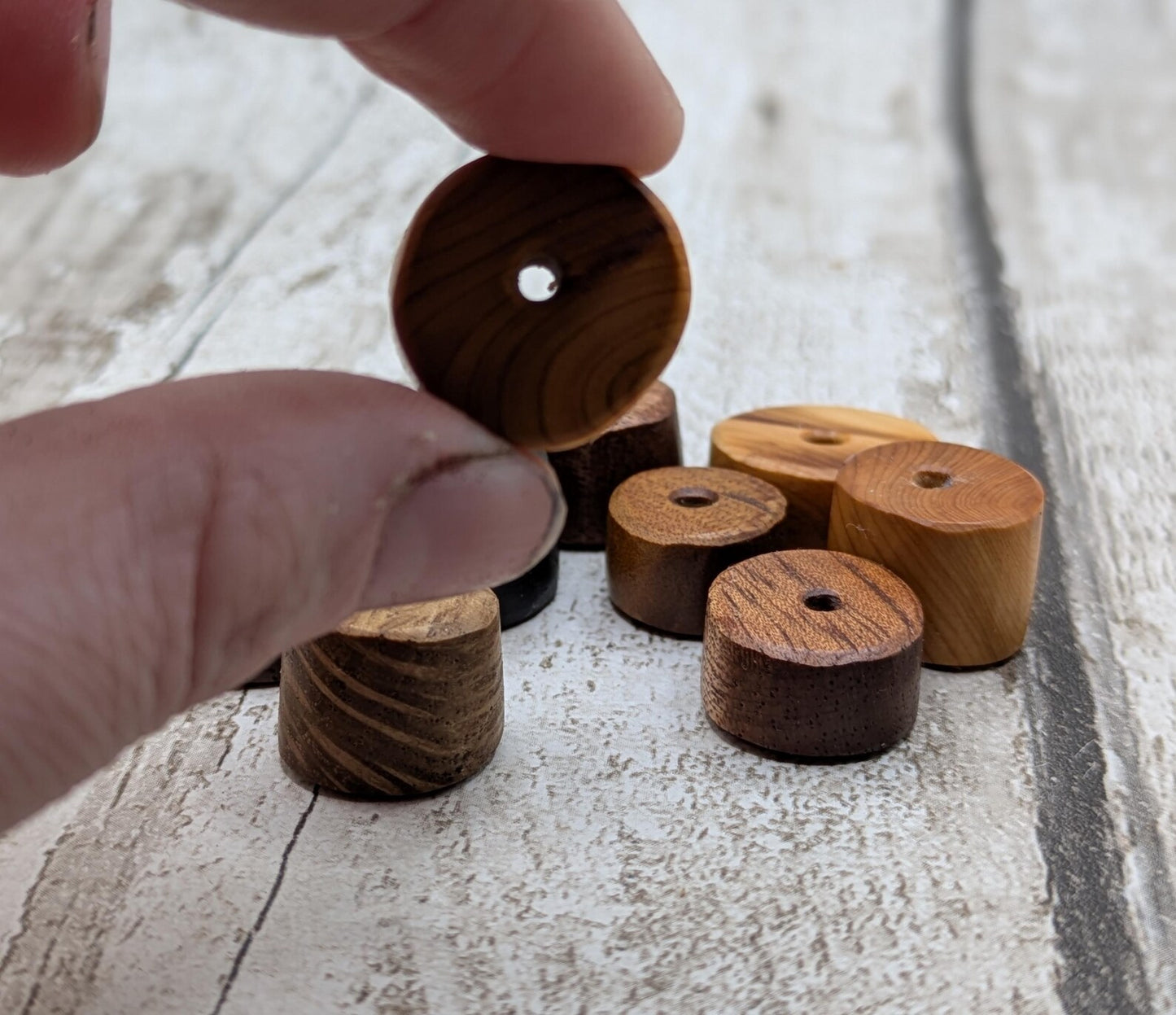 10 mixed random wooden tube beads.