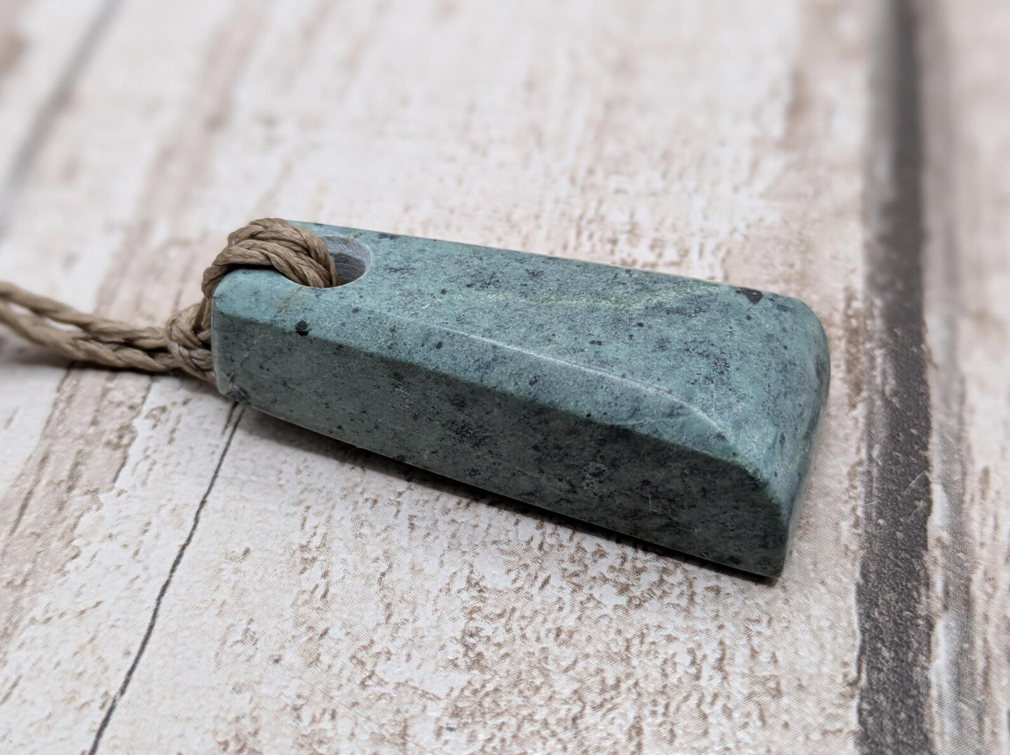 New Zealand Pounamu greenstone jade Hei Toki adze style pendant.