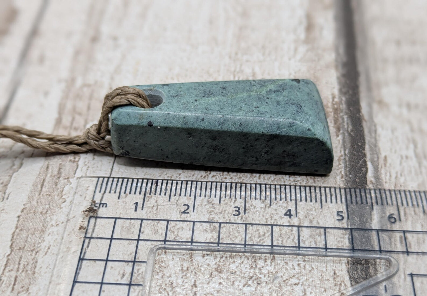 New Zealand Pounamu greenstone jade Hei Toki adze style pendant.