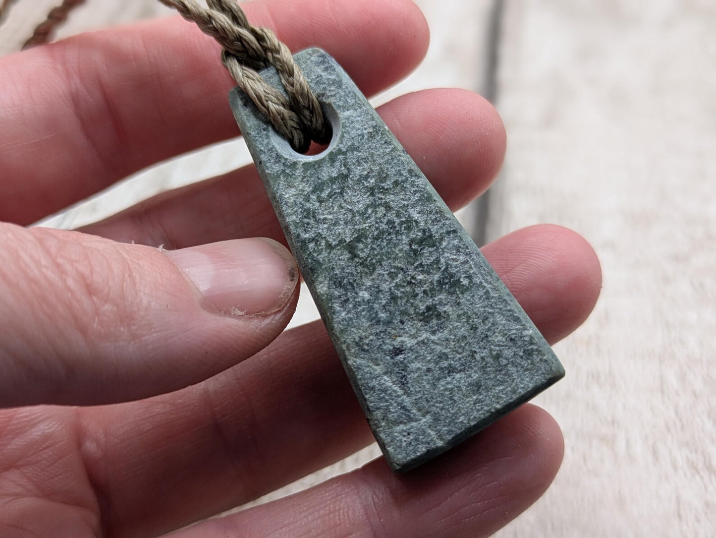 New Zealand Pounamu greenstone jade Hei Toki adze style pendant.