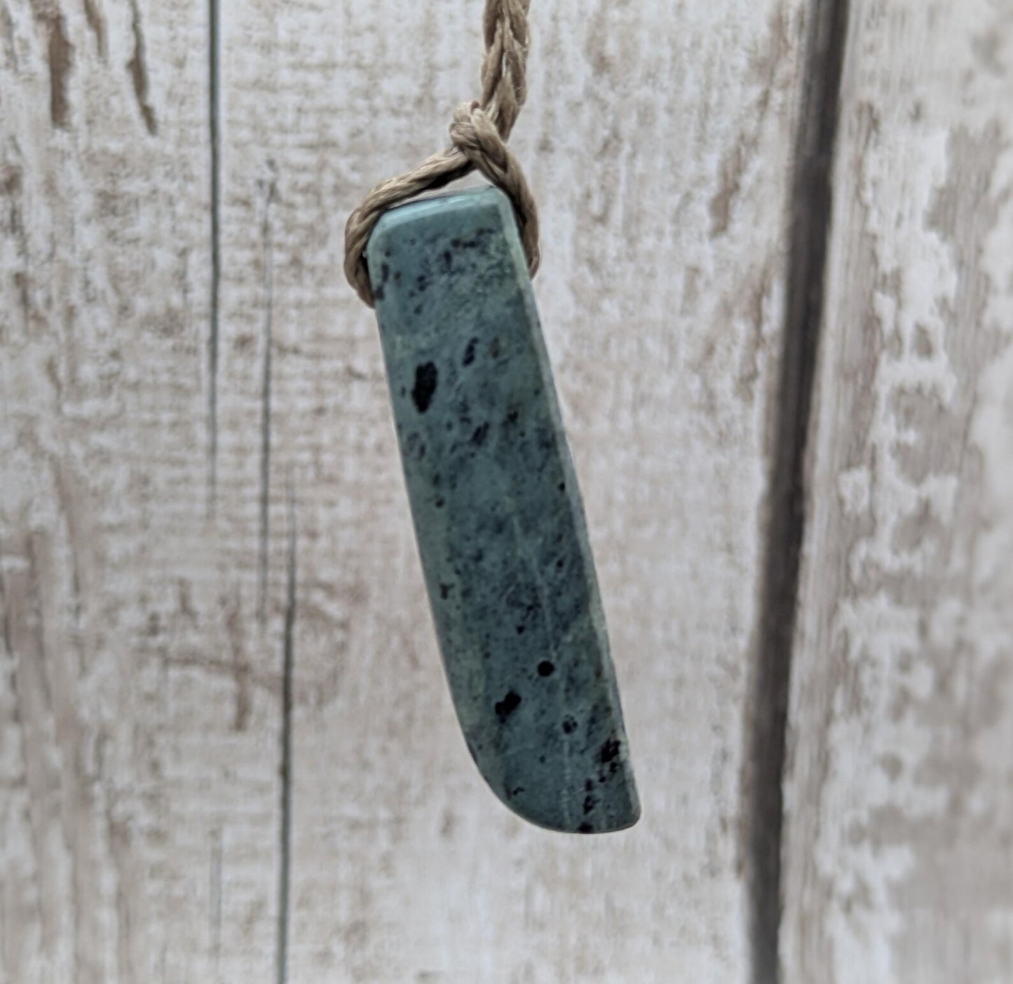 New Zealand Pounamu greenstone jade Hei Toki adze style pendant.