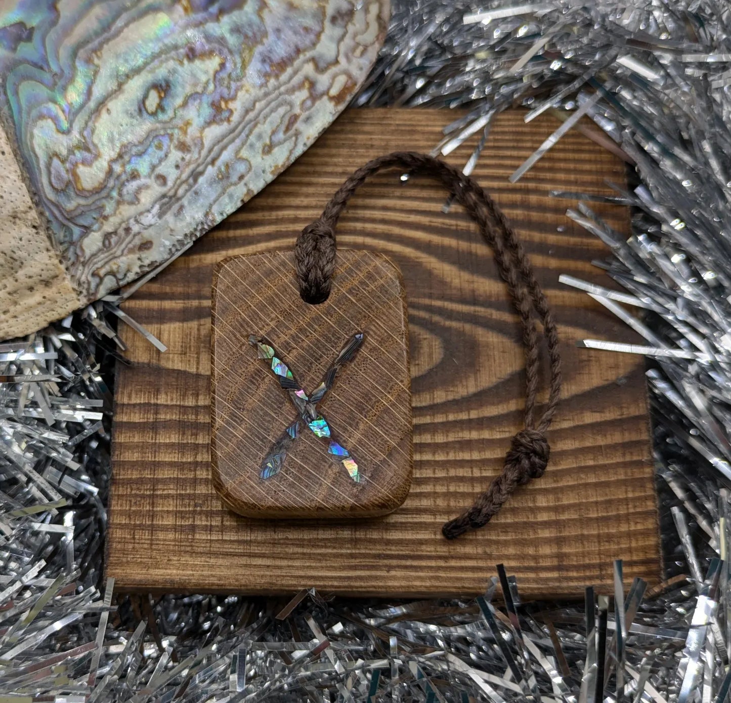 Oak wood gebo rune Christmas decoration with Pāua shell.