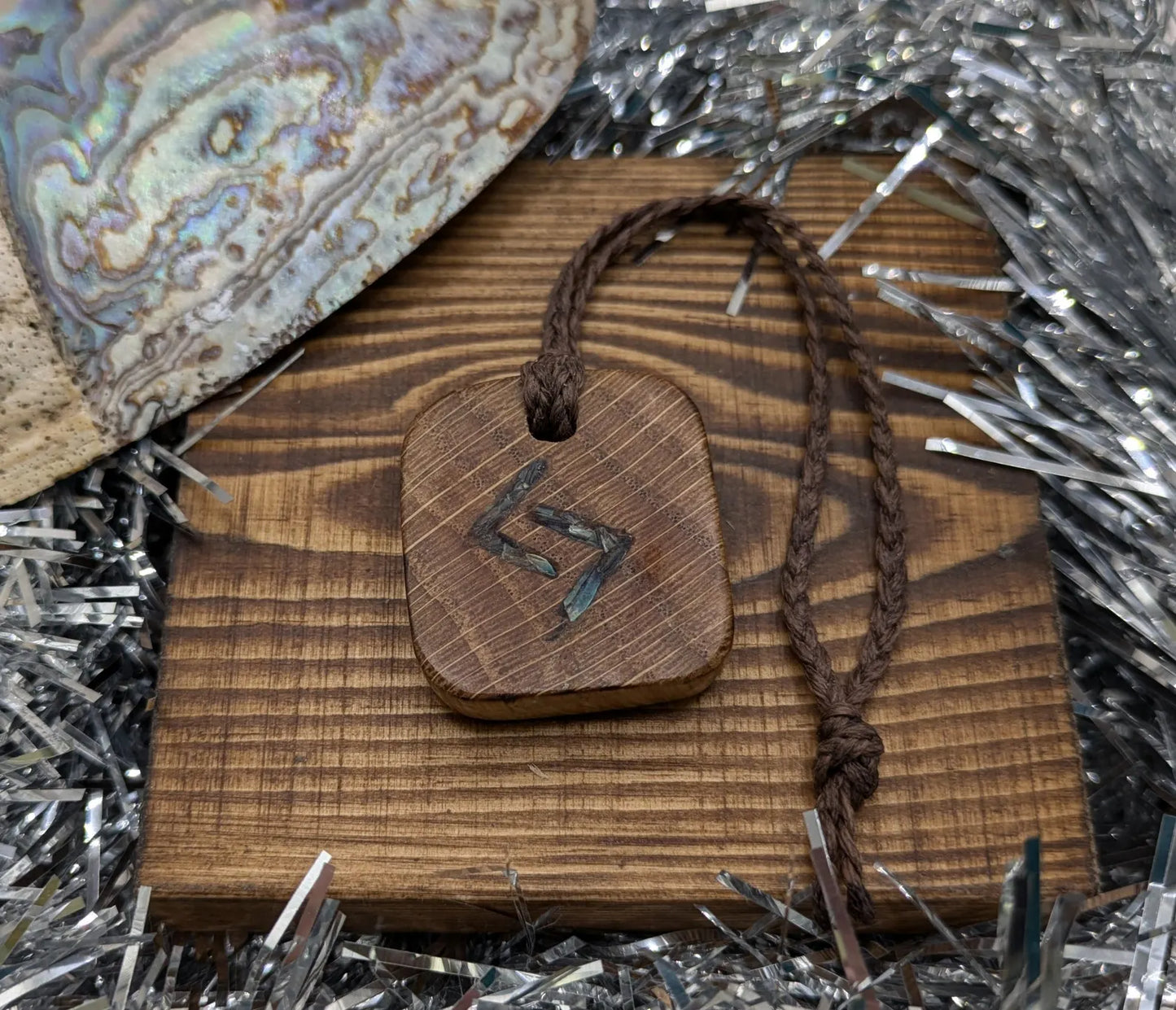 Oak wood jera Viking rune Christmas decoration with Pāua shell.