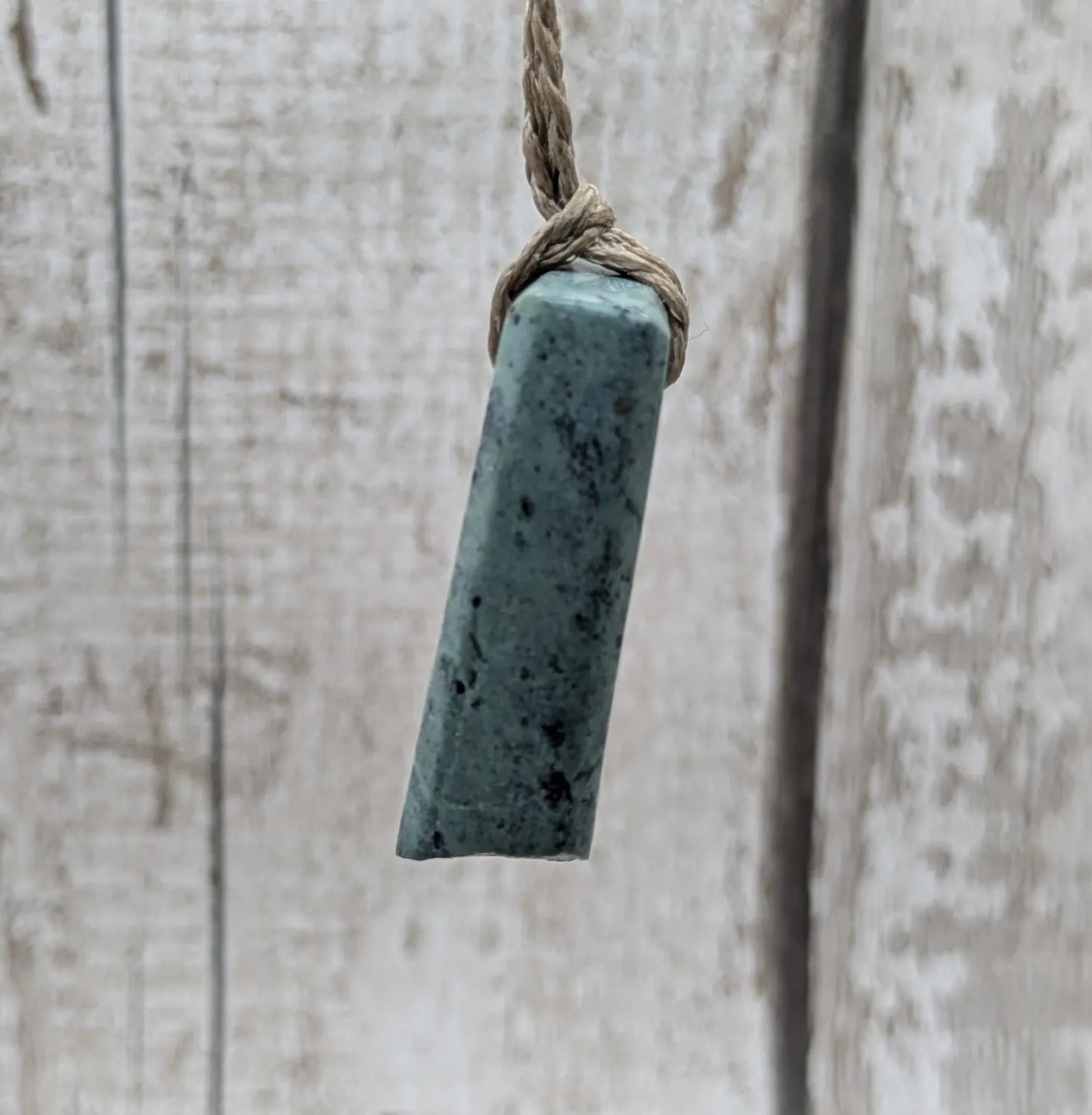 New Zealand pounamu Greenstone offcut raw edged pendant.
