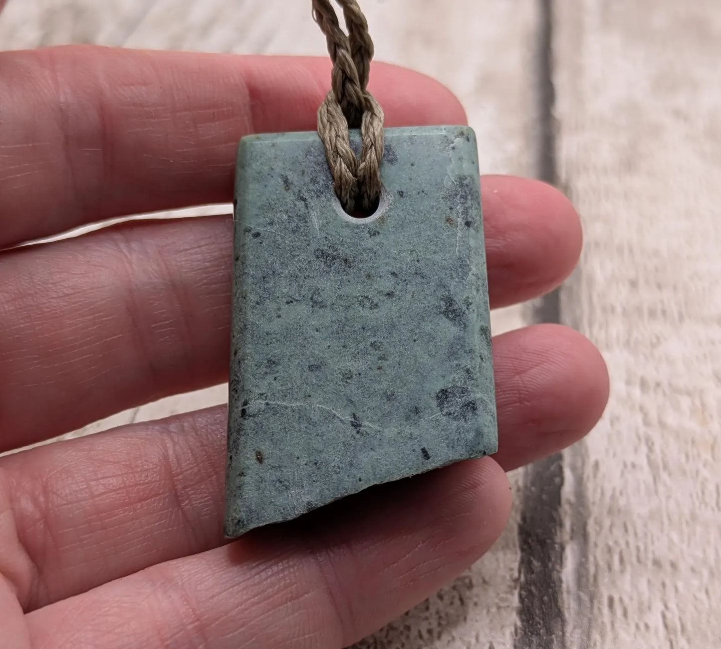 New Zealand pounamu Greenstone offcut raw edged pendant.
