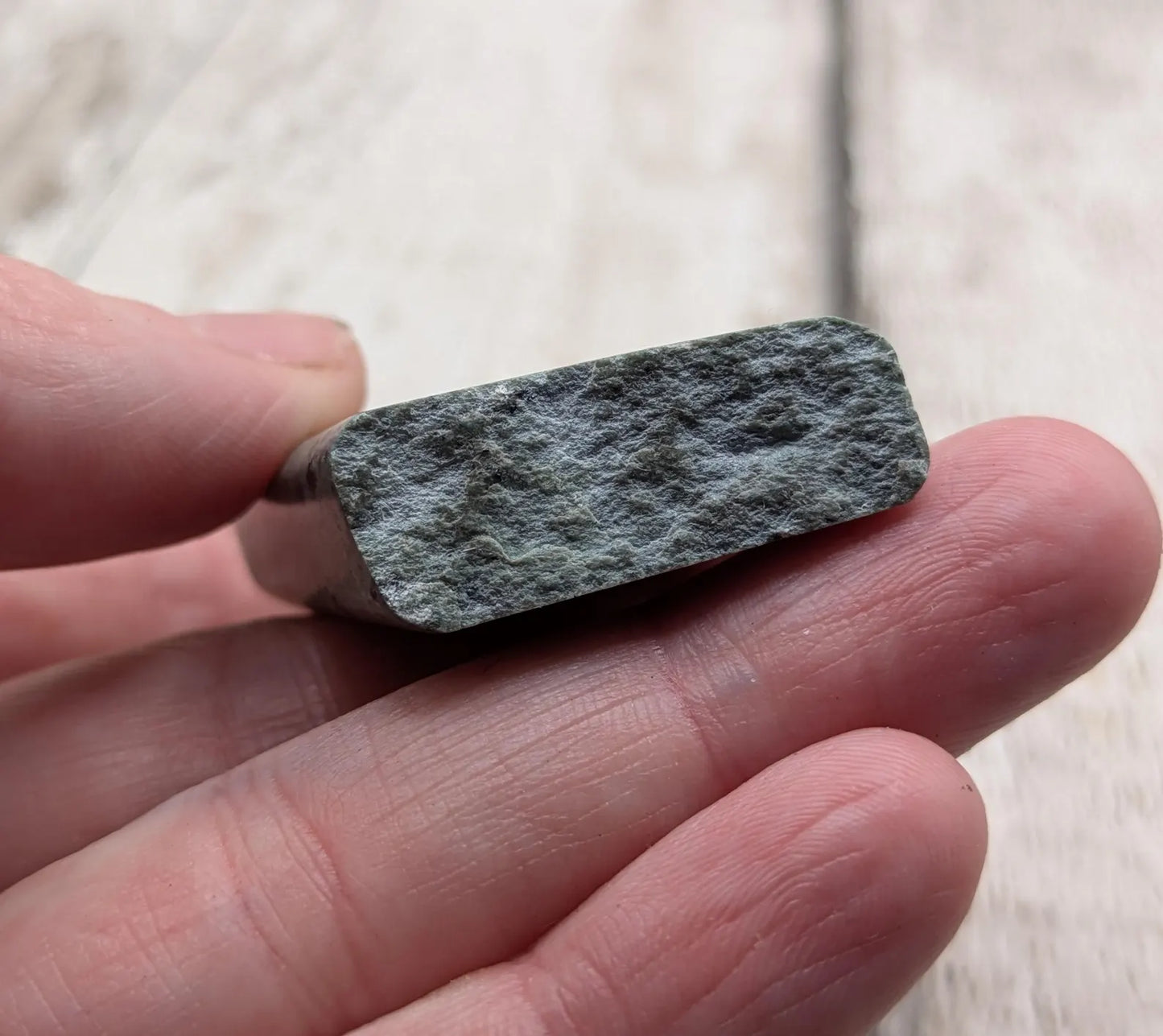 New Zealand pounamu Greenstone offcut raw edged pendant.