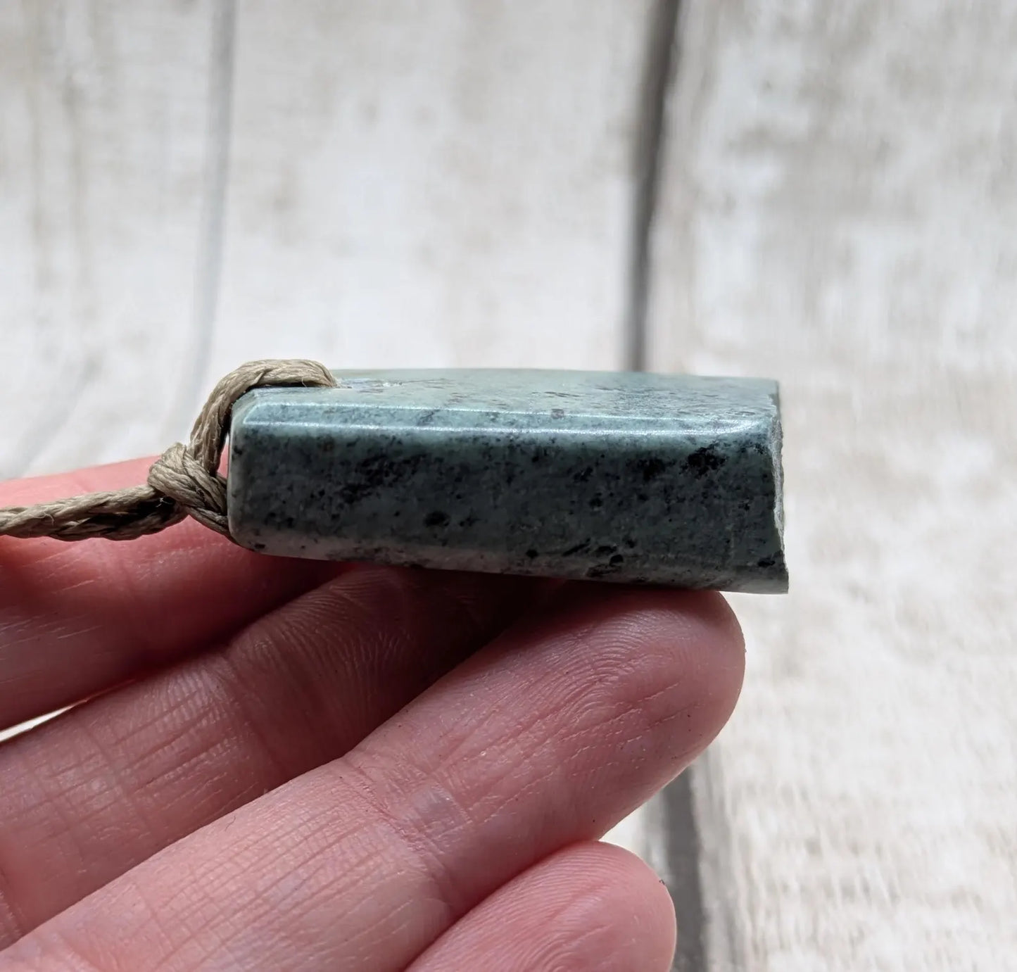New Zealand pounamu Greenstone offcut raw edged pendant.