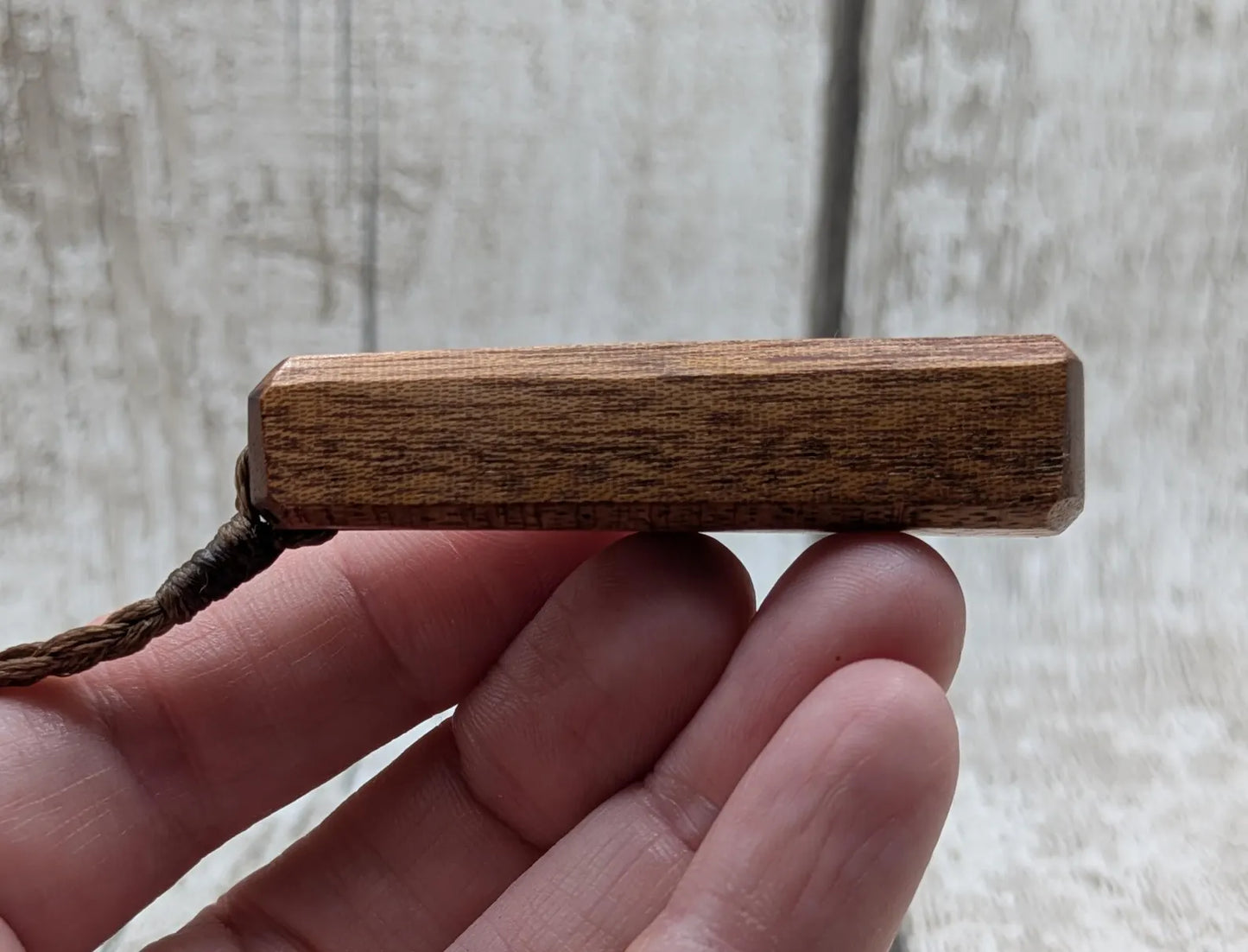 Sepele mahogany wood roimata tear drop pendant.