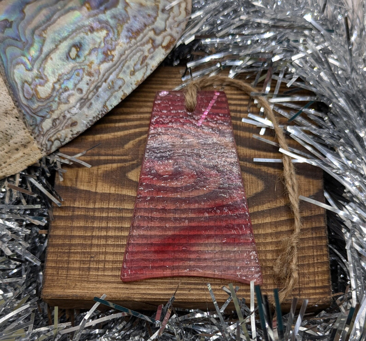 Red recycled stained glass Christmas decoration.