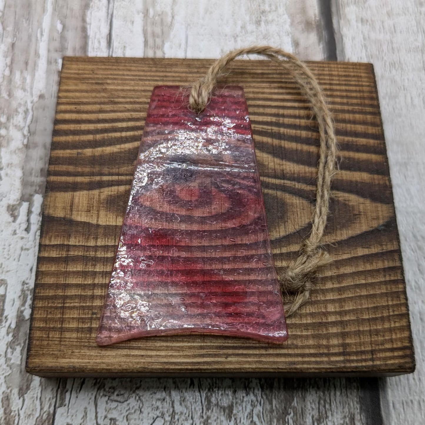 Red recycled stained glass Christmas decoration.