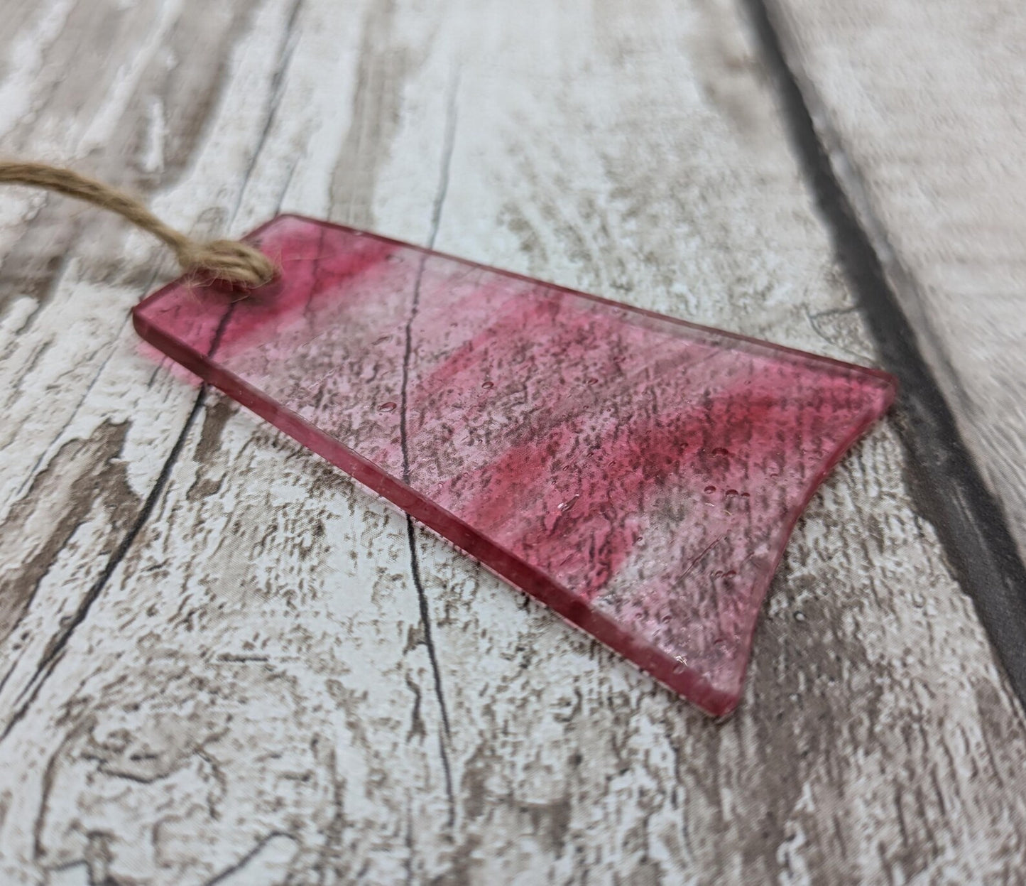 Red recycled stained glass Christmas decoration.