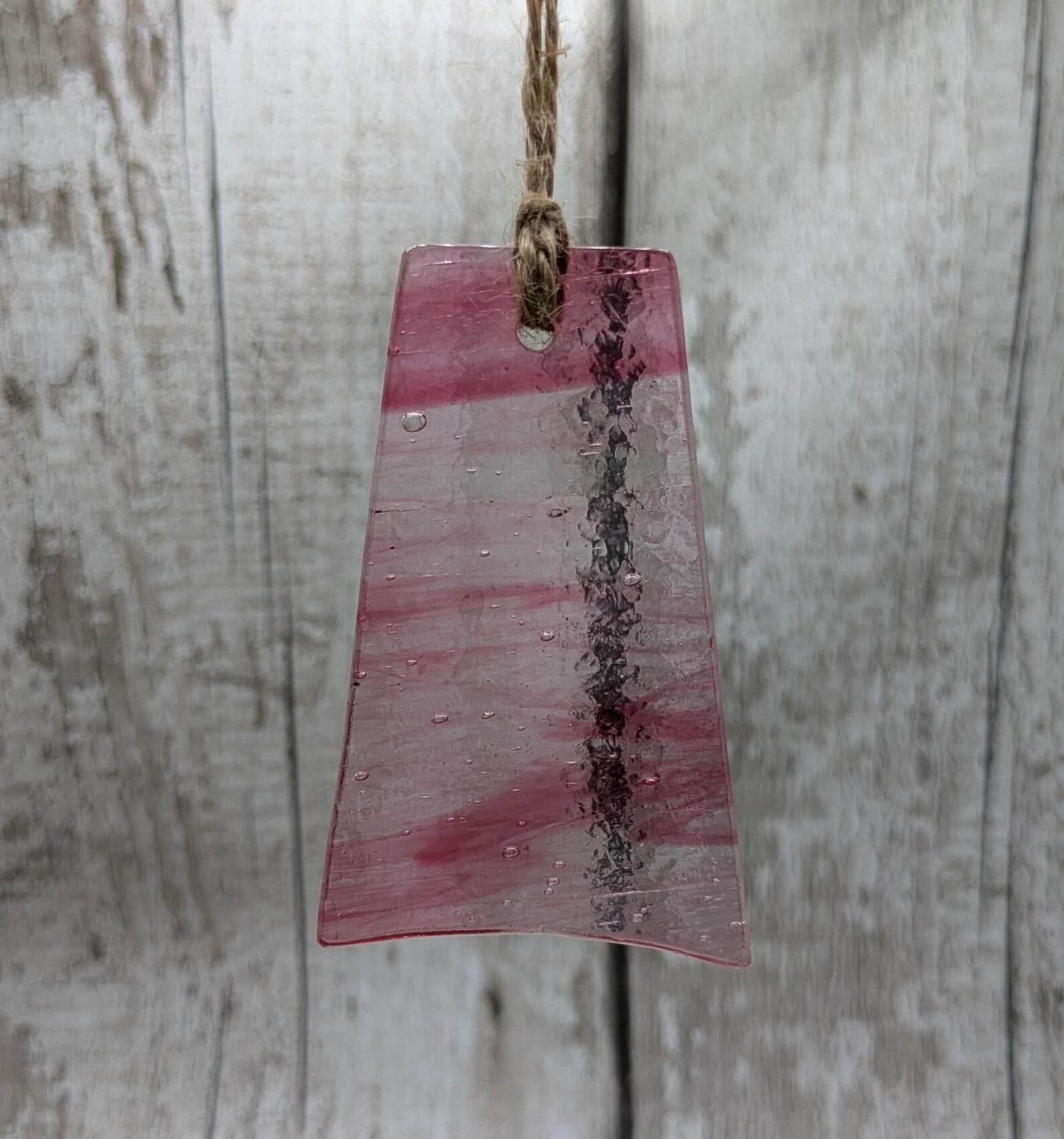 Red recycled stained glass Christmas decoration.