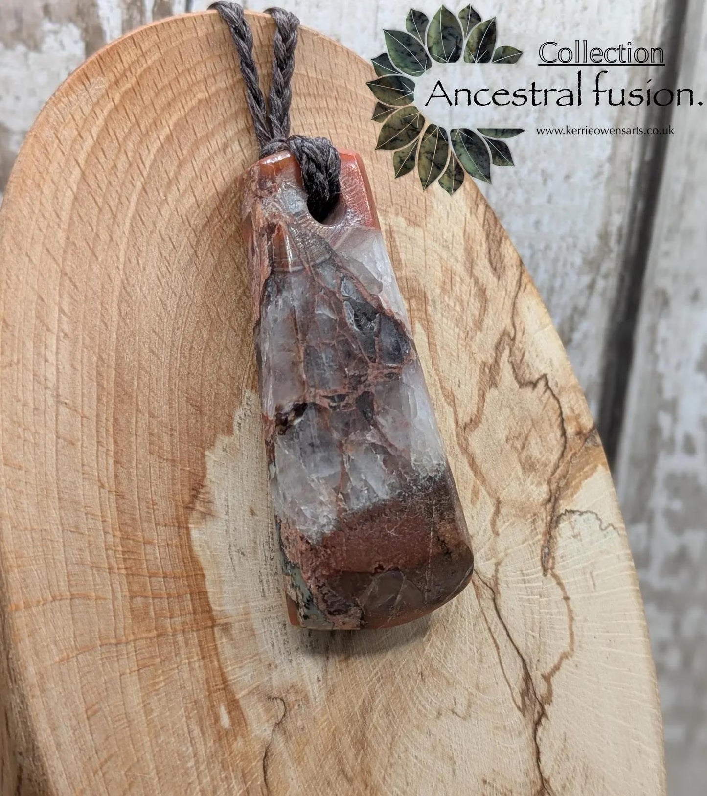 Scottish agate hei toki adze style pendant.