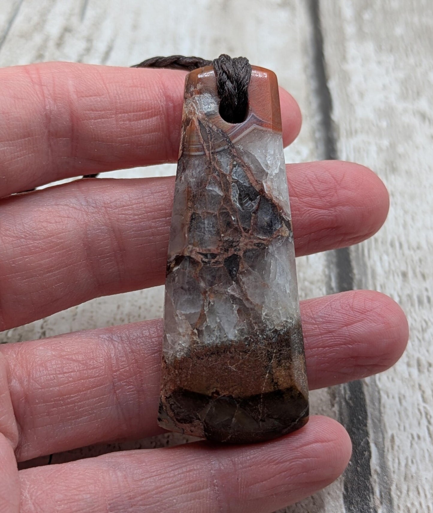 Scottish agate hei toki adze style pendant.