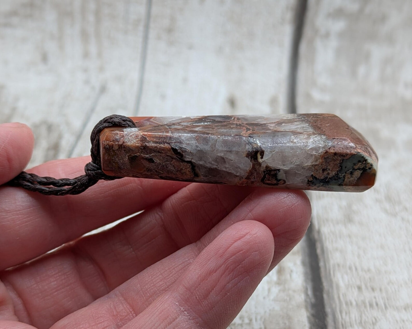 Scottish agate hei toki adze style pendant.