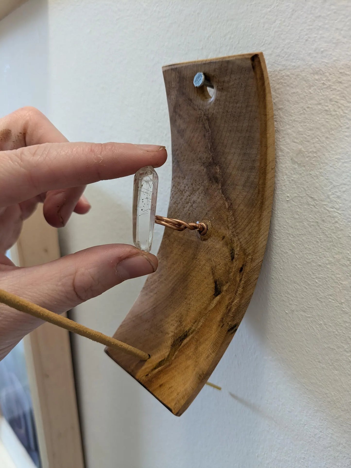 Recycled wood wall hanging incense holder with Tibetan quartz.