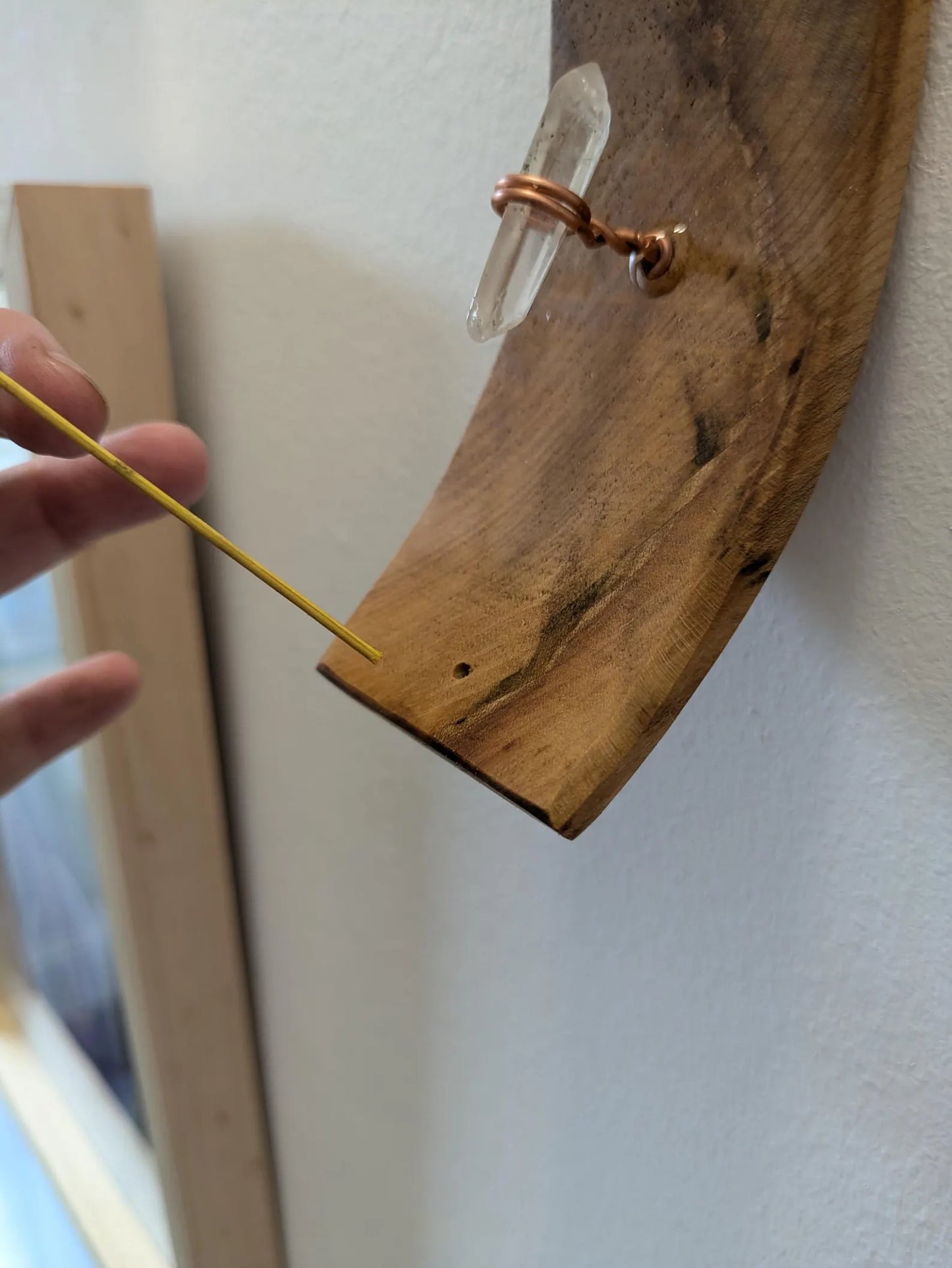 Recycled wood wall hanging incense holder with Tibetan quartz.