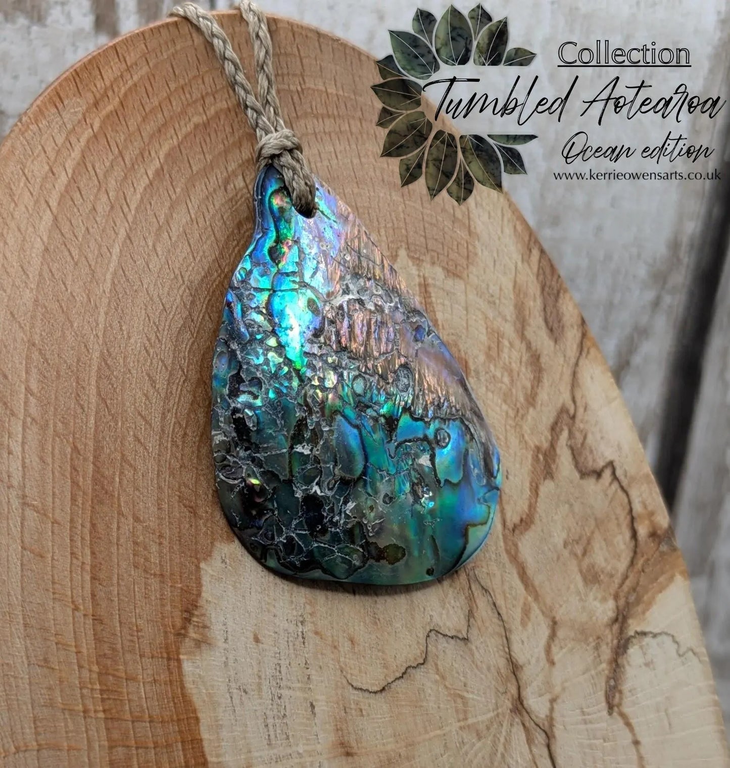 New Zealand free form wild tumbled rainbow Pāua pendant.