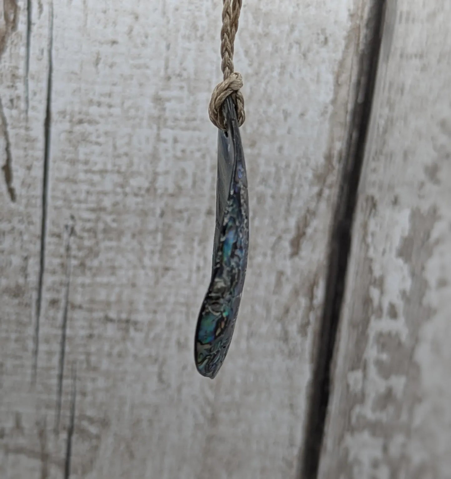 New Zealand free form wild tumbled rainbow Pāua pendant.