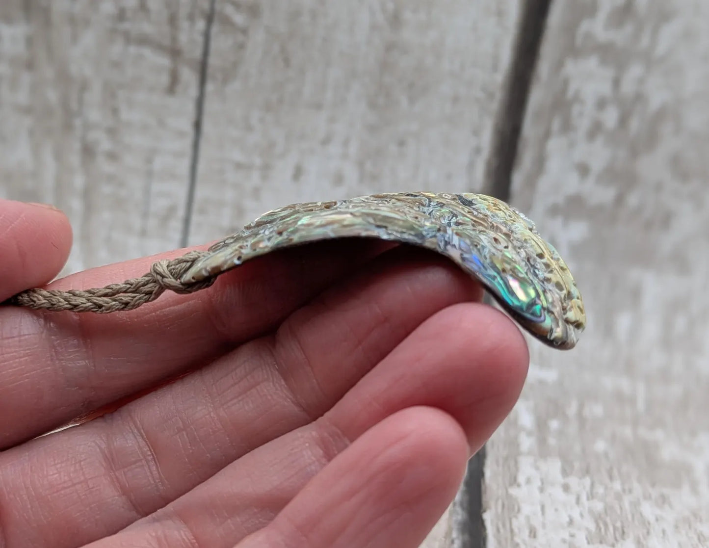 new Zealand Rainbow Pāua naturally tumbled shell pendant